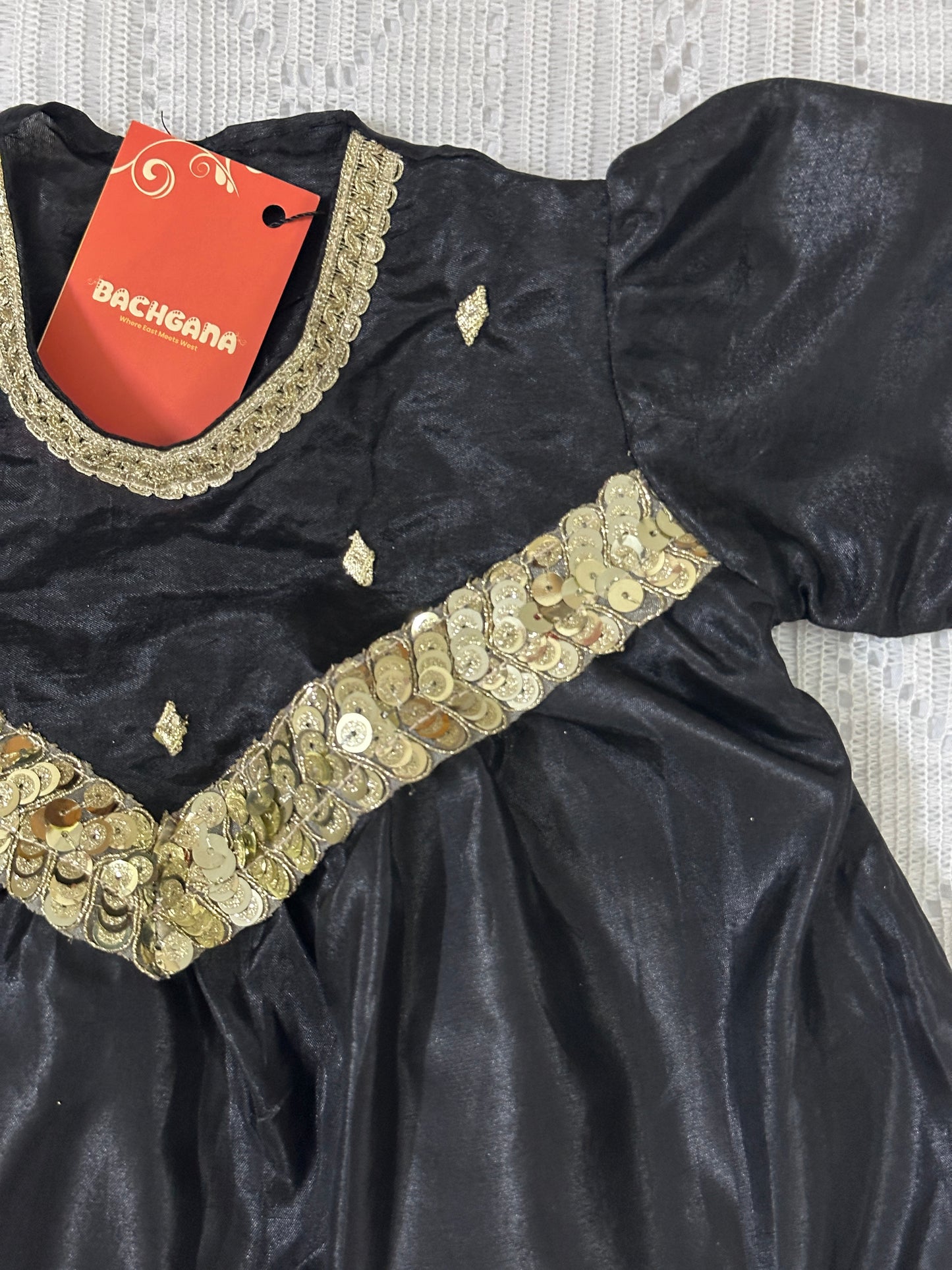 Black Silk V Yoke Frock with Tulip Shalwar and Net Dupatta