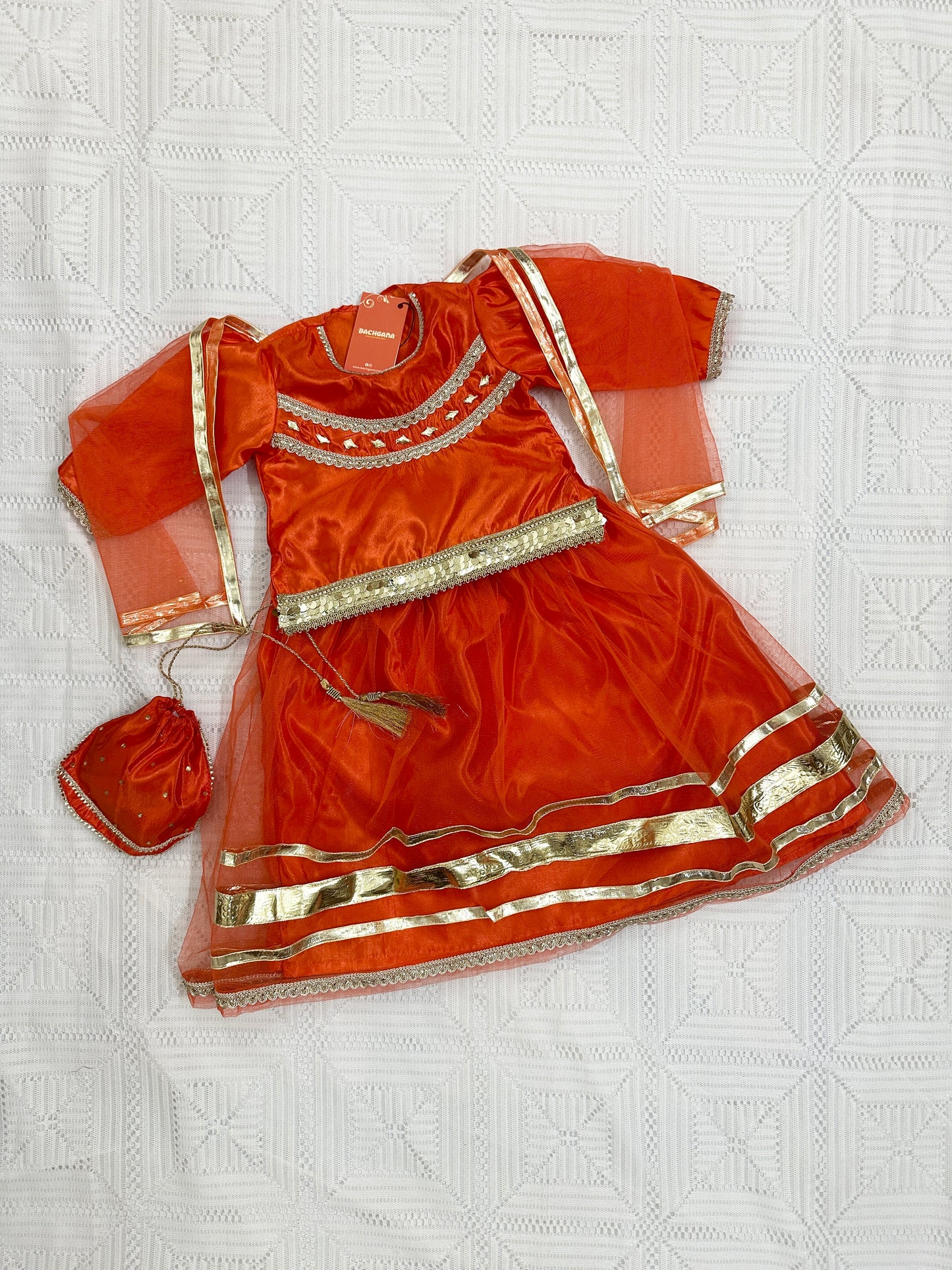 🧡 Orange Net Lehenga with Silk Choli, Net Dupatta and Silk Potli