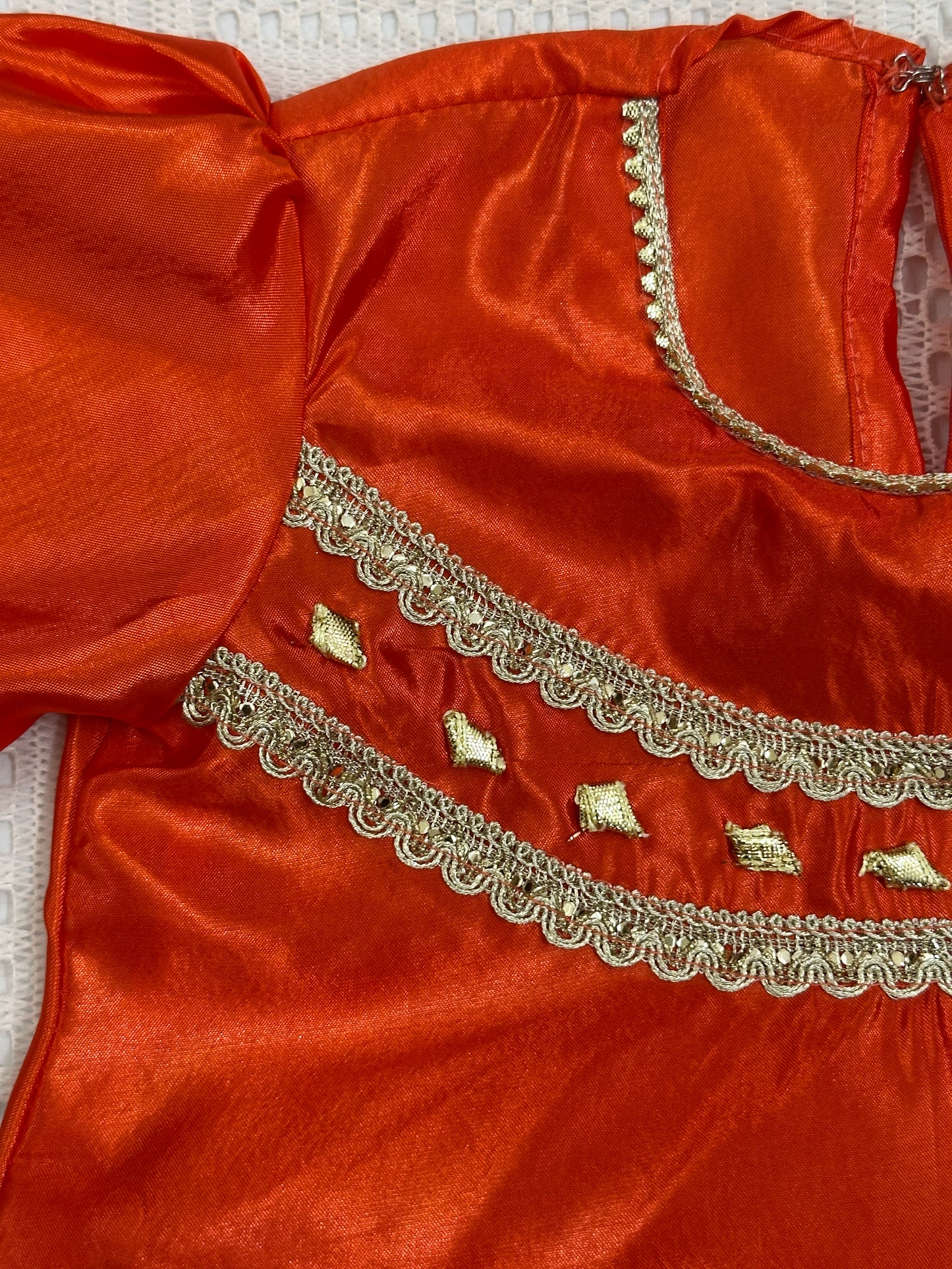 🧡 Orange Net Lehenga with Silk Choli, Net Dupatta and Silk Potli