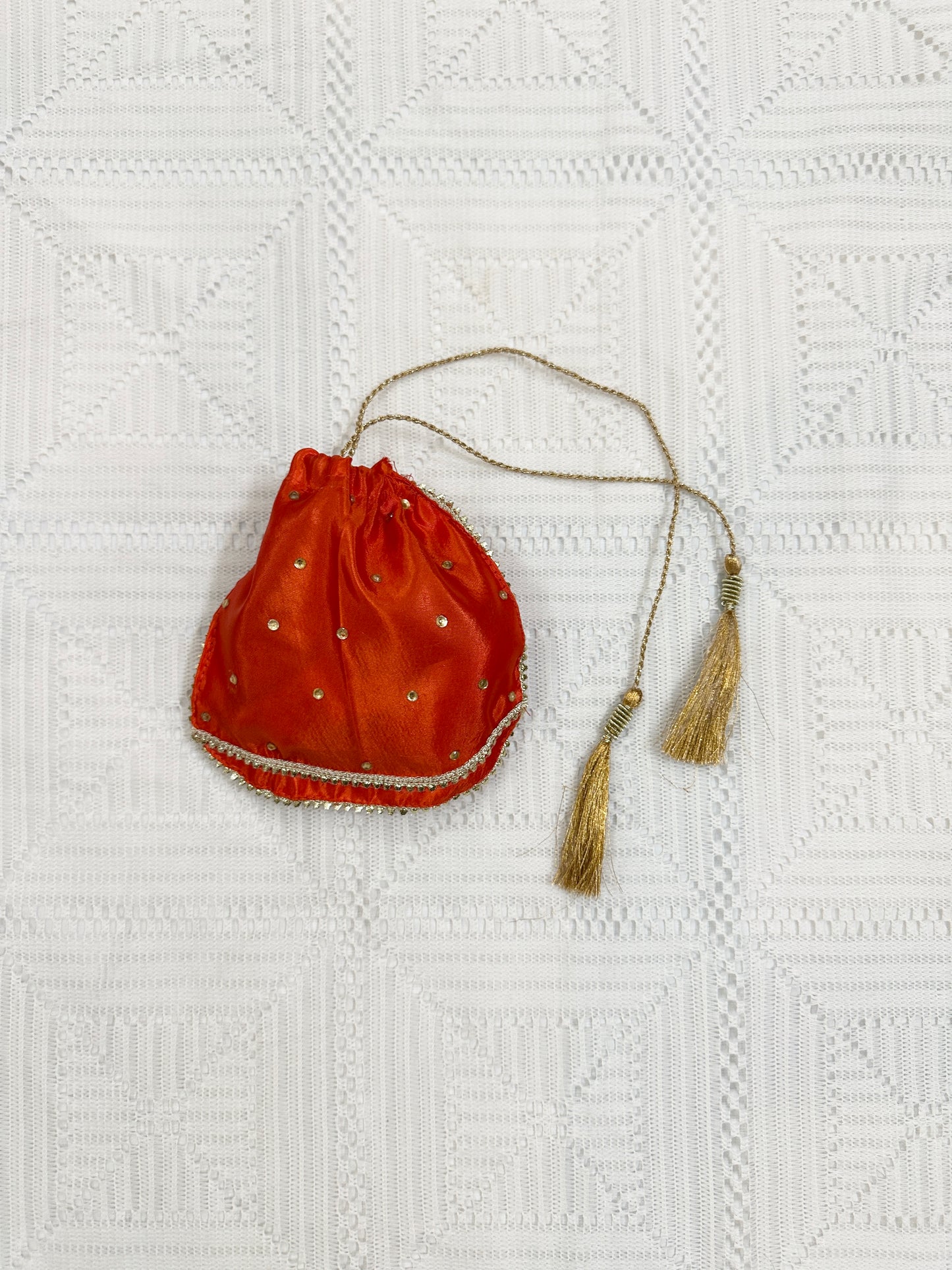 🧡 Orange Net Lehenga with Silk Choli, Net Dupatta and Silk Potli