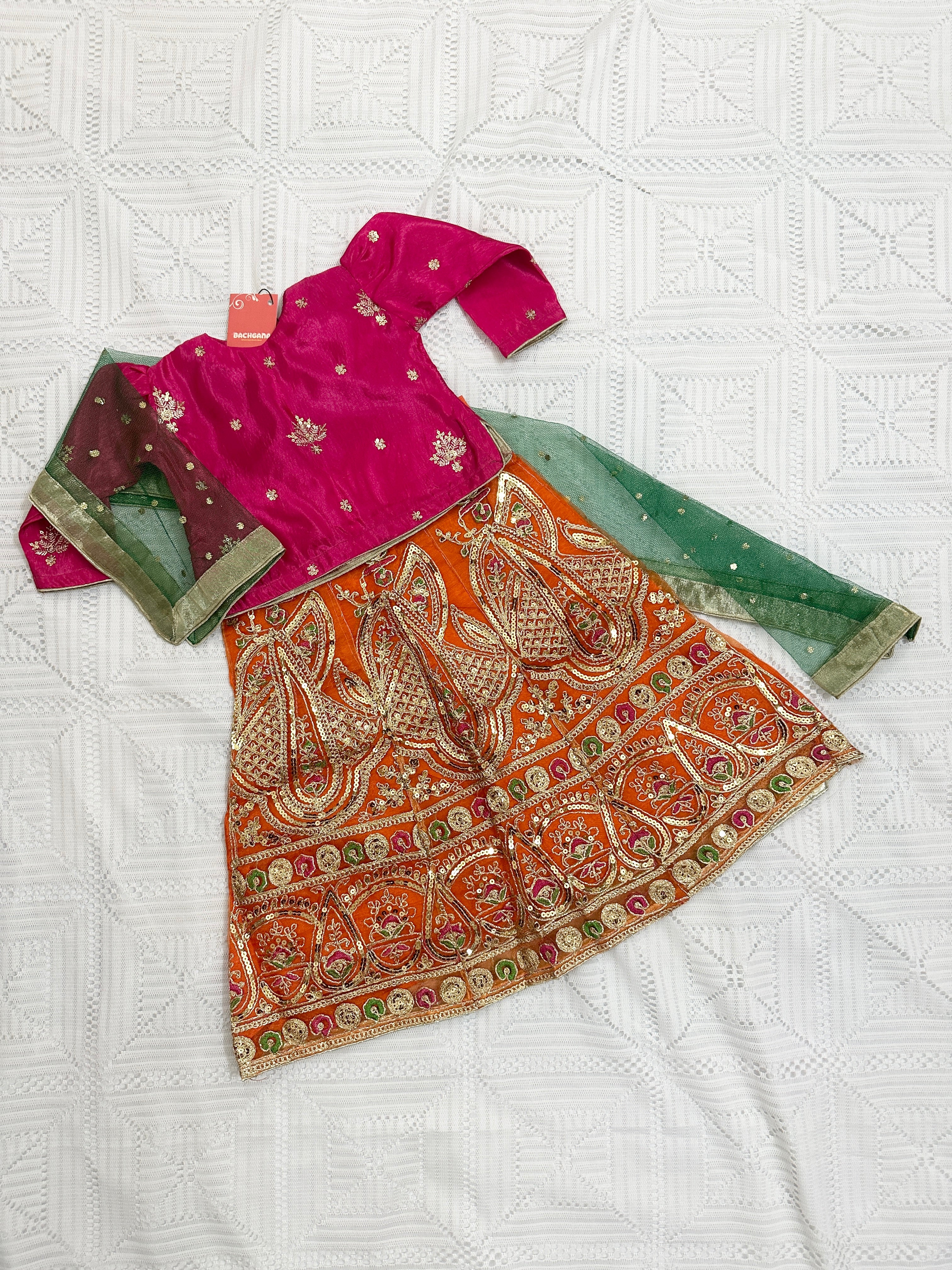 🌸 Pink Silk Choli with Orange Sequin Net Lehenga and Green Net Dupatta